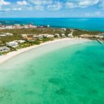 crystal-sands-luxury- beachfront-villa-turks-caicos-real-estate-drone view of bay