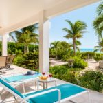 crystal-sands-luxury- beachfront-villa-turks-caicos-real-estate-outdoor lower level lounging