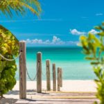 crystal-sands-luxury- beachfront-villa-turks-caicos-real-estate-outdoor view of boardwalk to beach
