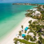 crystal-sands-luxury- beachfront-villa-turks-caicos-real-estate-side drone view of property