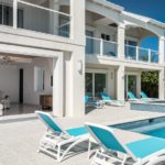 beachfront-sunrise-villa-turks-caicos-lower level pool deck and view into home