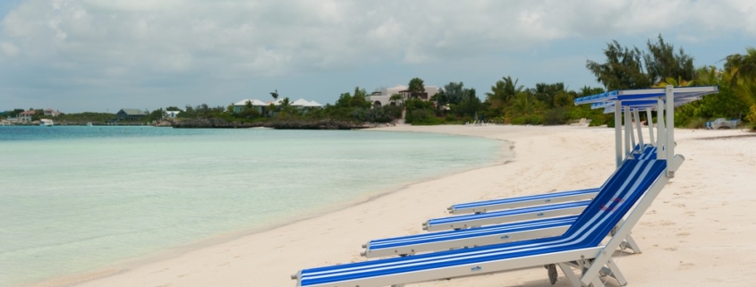 coconut-beach-villa-turks-caicos beach chairs on sapodilla bay beach