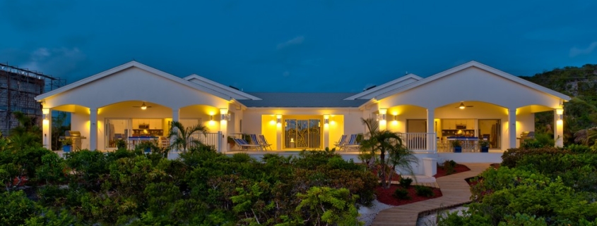 coconut-beach-villa-turks-caicos night view of property from beach