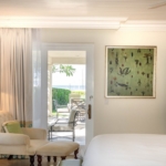 palms-turks-caicos-condo-suite-1107/08 primary bedroom view to patio