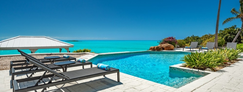 three-cays-villa-turtle tail bristol hill pool deck view to pool and ocean