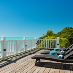 three-cays-villa-turtle tail bristol hill pool view ocean ocean from oceanfront lounge area