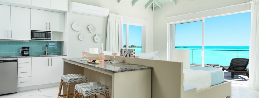 three-cays-villa-turtle tail bristol hill guest house bedroom and kitchen area