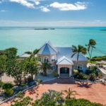three-cays-villa-turtle tail bristol hill drone front view of villa with driveway
