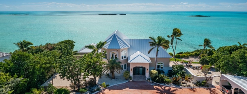 three-cays-villa-turtle tail bristol hill drone front view of villa with driveway