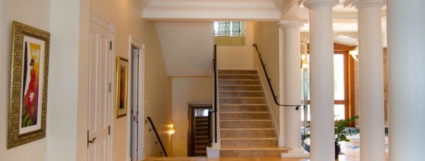 leeward-waterfront-estate-villa-penn-sawyer stairs to up level bedrooms