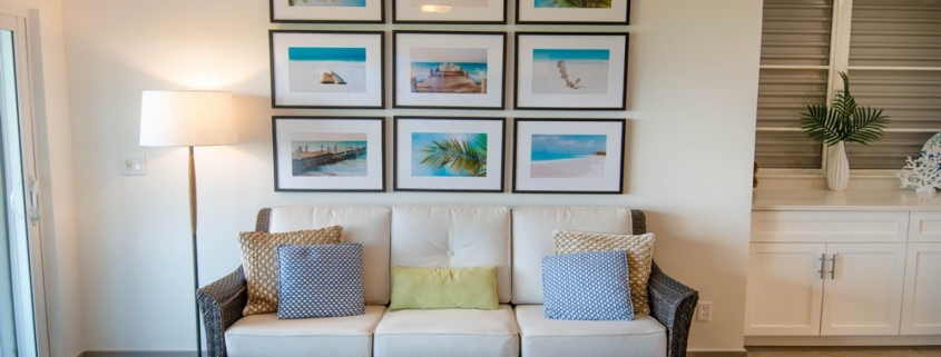 ocean-club-beachfront-condo-suite-1103 living area sofa and artwork photos