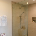 ocean-club-beachfront-condo-suite-1103 primary suite shower stall