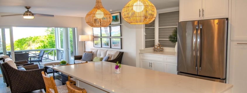 ocean-club-beachfront-condo-suite-1103 kitchen island view to living area
