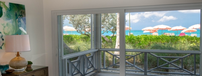 ocean-club-beachfront-condo-suite-1103 primary bedroom suite to balcony view