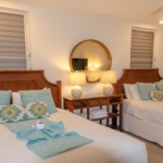 ocean-club-beachfront-condo-suite-1103 second bedroom twin beds