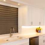 ocean-club-beachfront-condo-suite-1103 kitchen view sink and cupboards