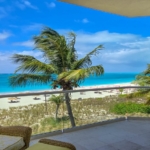 pinnacle-suite-303-3-bed-grace-bay-beachfront-condo balcony north shore view