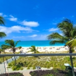 pinnacle-suite-303-3-bed-grace-bay-beachfront-condo balcony north shore view