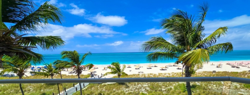 pinnacle-suite-303-3-bed-grace-bay-beachfront-condo balcony north shore view