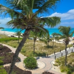 pinnacle-suite-303-3-bed-grace-bay-beachfront-condo balcony north shore view