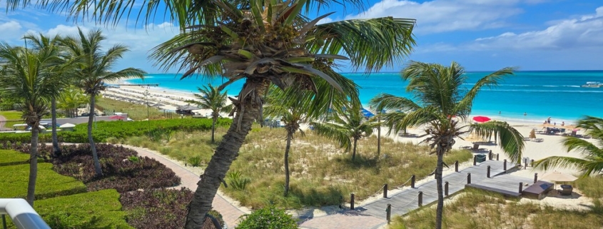 pinnacle-suite-303-3-bed-grace-bay-beachfront-condo balcony north shore view