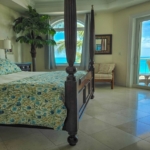 pinnacle-suite-303-3-bed-grace-bay-beachfront-condo primary bedroom view