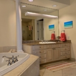 pinnacle-suite-303-3-bed-grace-bay-beachfront-condo primary bedroom bathroom view