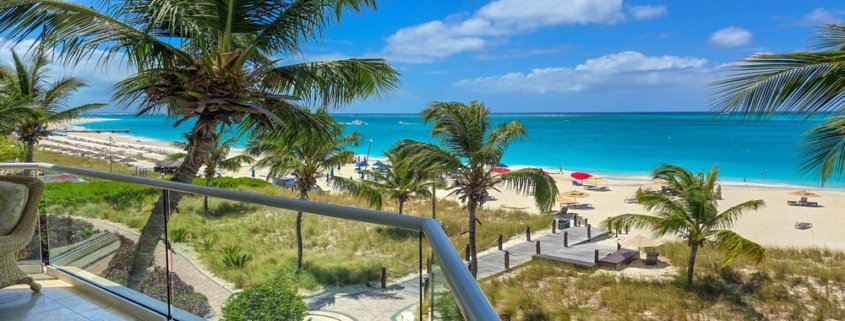 pinnacle-suite-303-3-bed-grace-bay-beachfront-condo balcony north shore view