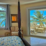 pinnacle-suite-303-3-bed-grace-bay-beachfront-condo primary bedroom view