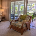 ocean-club-west-suite-511-one-bedroom-view of living room chair and balcony