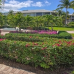 ocean-club-west-suite-511-one-bedroom-view of resort landscaping fountain