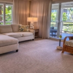 ocean-club-west-suite-511-one-bedroom-view of living room to balcony