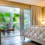 ocean-club-west-suite-511-one-bedroom-view of bedroom to private balcony