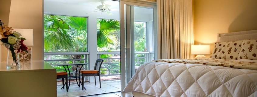 ocean-club-west-suite-511-one-bedroom-view of bedroom to private balcony