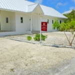 turks-caicos-house-for-sale-leeward-exterior front view with sales sign