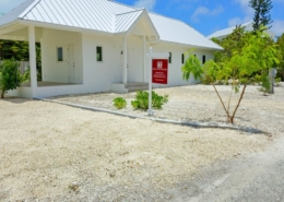 turks-caicos-house-for-sale-leeward-exterior front view with sales sign