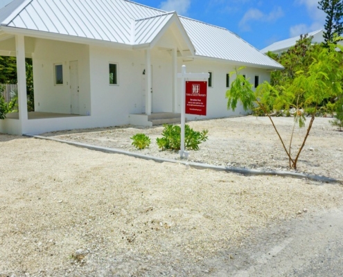 turks-caicos-house-for-sale-leeward-exterior front view with sales sign