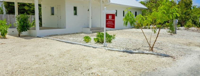 turks-caicos-house-for-sale-leeward-exterior front view with sales sign