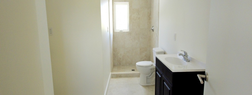 turks-caicos-house-for-sale-leeward-interior second bathroom with vanity toilet and shower