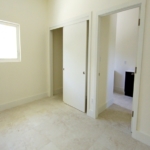 turks-caicos-house-for-sale-leeward-interior bedroom view to ensuite bathroom