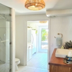 waterfront-turks-caicos-homes-for-sale-palm-point second bathroom view to hall