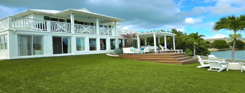 waterfront-turks-caicos-homes-for-sale-palm-point exterior of home lawn