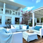 waterfront-turks-caicos-homes-for-sale-palm-point out door lounge on deck