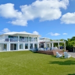 waterfront-turks-caicos-homes-for-sale-palm-point-exterior yard view to main house