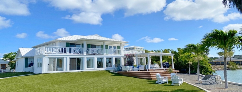 waterfront-turks-caicos-homes-for-sale-palm-point-exterior yard view to main house