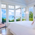 providenciales-oceanfront-home-chalk-sound ocean view primary bedroom suite