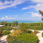 providenciales-oceanfront-home-chalk-sound exterior view of gardens to ocean