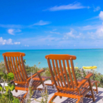 providenciales-oceanfront-home-chalk-sound seating area by the ocean