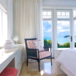 providenciales-oceanfront-home-chalk-sound ocean view primary bedroom suite