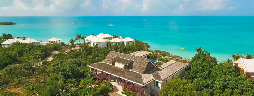 providenciales-oceanfront-home-chalk-sound drone view of property and area